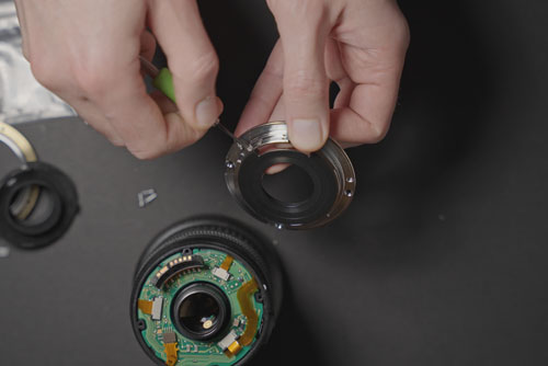 Undoing screws to separate inner ring from outer ring on replacement EF mount for Canon 10-22mm lens